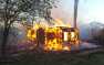 Жилой дом горит в Горловке в результате обстрела ВСУ