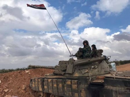 Российские и сирийские военные на позициях севернее Менбиджа