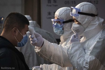 Китайские медики рассказали о новых симптомах и способах передачи коронавируса