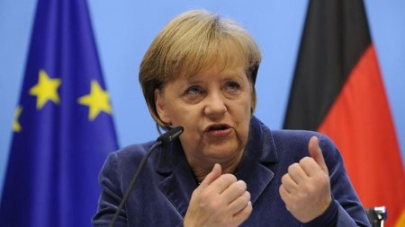 Партия Меркель предварительно побеждает на региональных выборах в ФРГ